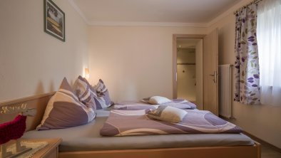 Appartement Kapellenblick - Schlafzimmer 1, © Hannes Dabernig