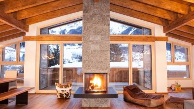 Fireplace after a day on the slopes, © Riffler Lodge