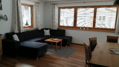 Wohnzimmer mit ausziehbarer Couch