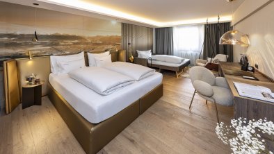 Doppelzimmer-Extrabett-Design-Innsrbuck-Stil-Hotel