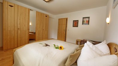 MoiggI Mayrhofen - Schlafzimmer/ Dreibett