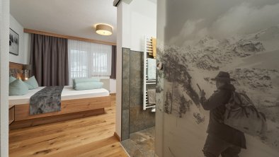 Schlafzimmer mit Zugang zum Badezimmer