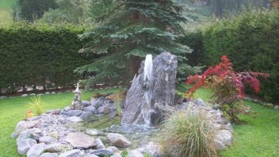 Ferienwohnung Babsi Ginzling - Garten Brunnen