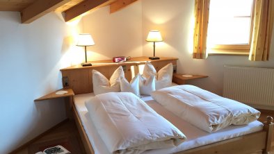 Doppelbett in der Ferienwohnung in Alpbach, © Wellnessappartements Margit