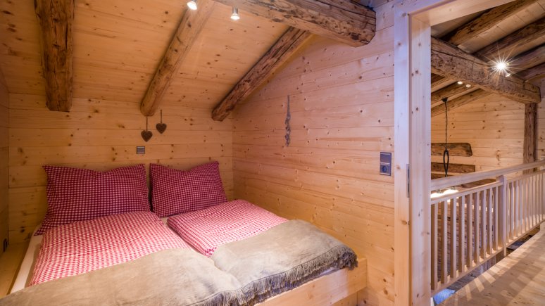 Schlafzimmer im Chalet Ursteinhütte, © Jakob Gastl