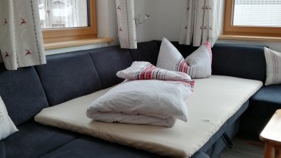 Schlafmöglichkeit auf der ausziehbaren Couch